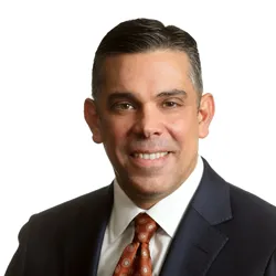 Carlos M. Bollar, Esq.